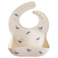 Mushie Silicone Baby Bib (Whales)