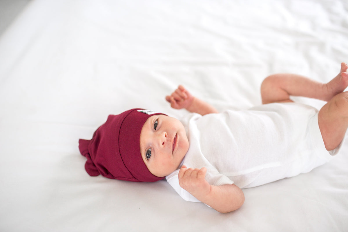 Copper Pearl Top Knot Hat - Ruby